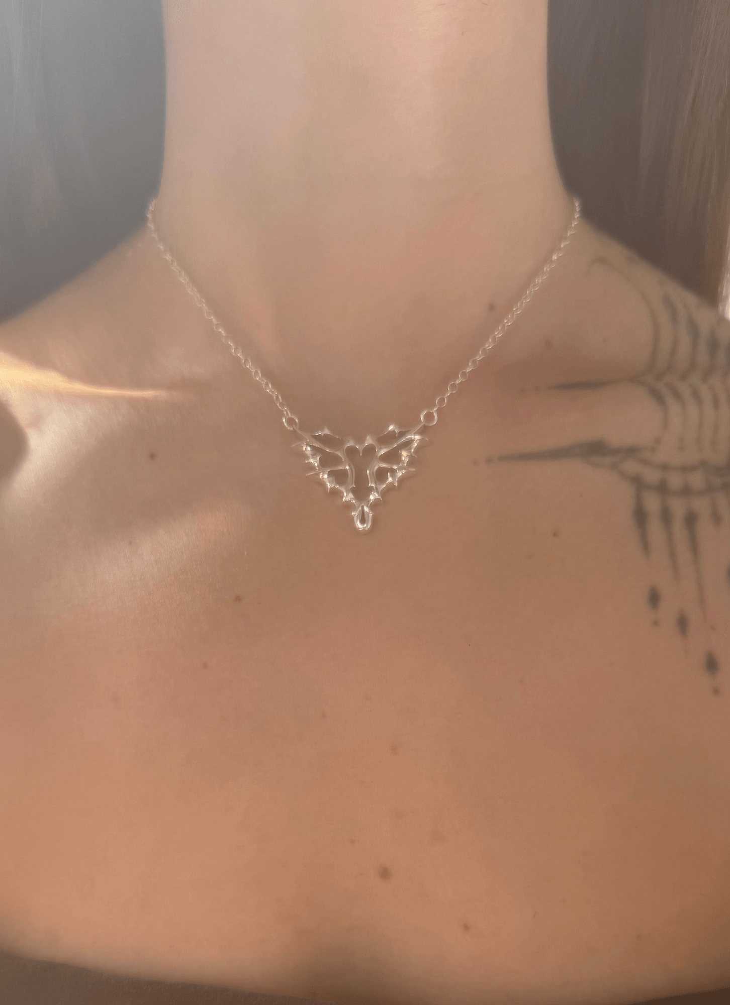 Xrated Heart necklace